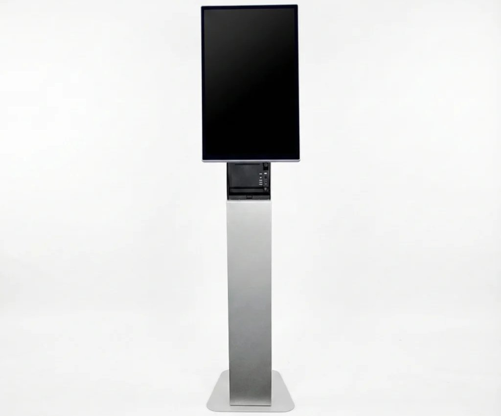 Quick service POS terminal with large touchscreen and countertop stand, designed for fast casual restaurants and high-volume checkout.